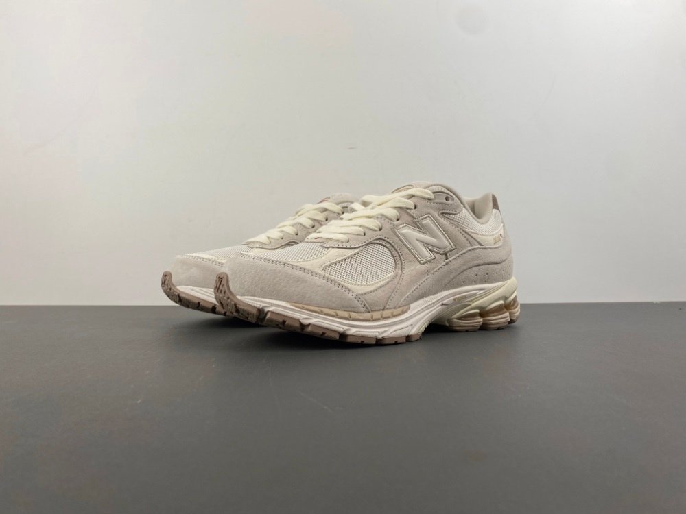 J version new balance NB 2002 off-white milk tea color item number M2002RHX original version J19 number 36-465 shipped 20